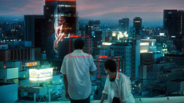 Film still from Happyend (2024). Image of two high school aged boys looking over the city, red boxes identify their positions.
